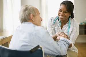 Caregiver assuring recovering adult client
